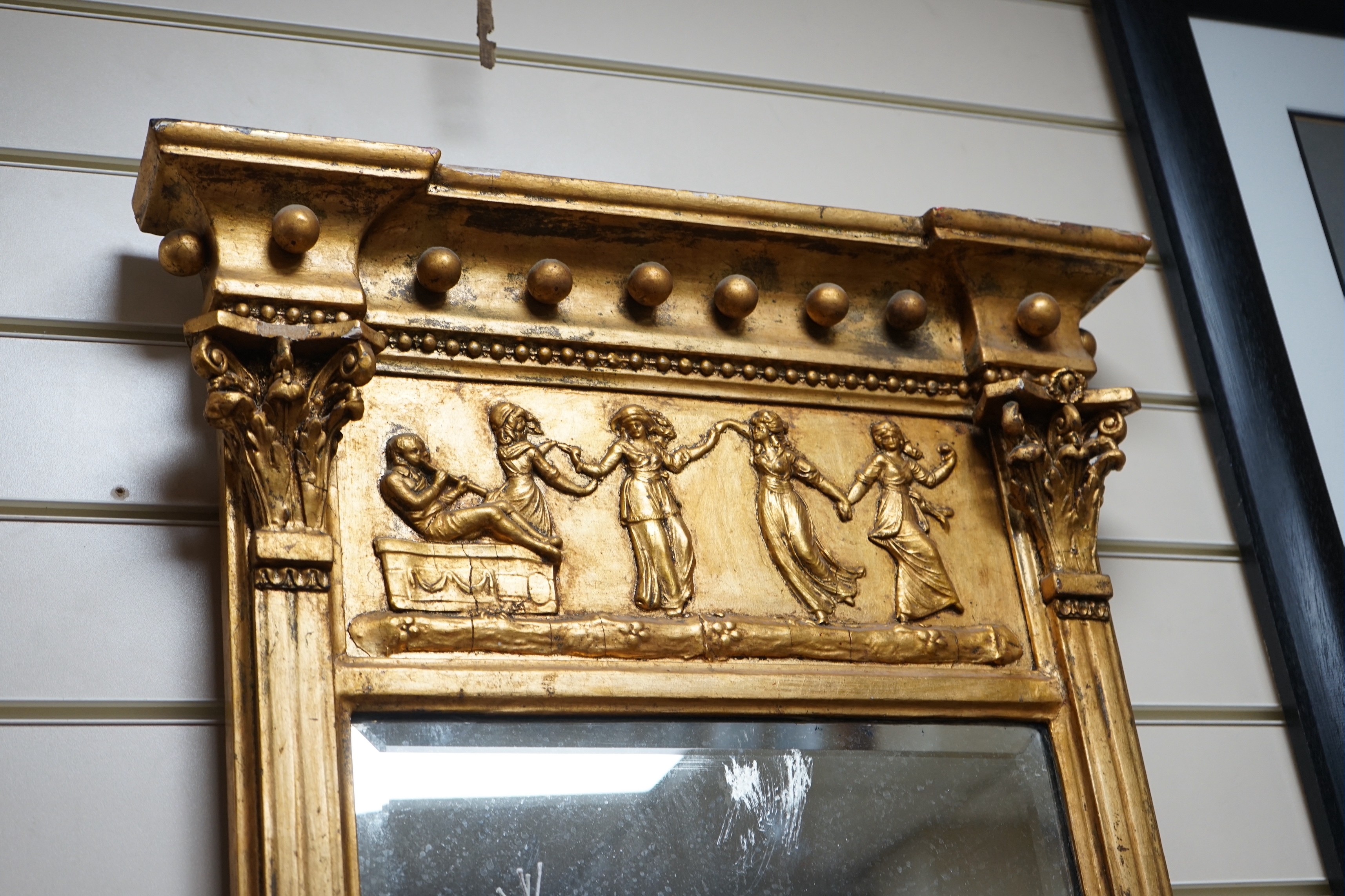 A Regency giltwood and gesso pier glass, width 49cm, height 99cm